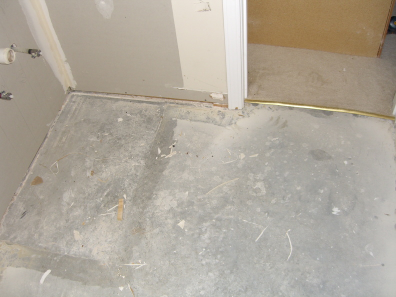 Linoleum is ripped up.