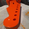 Shaped and now painting the headstock.