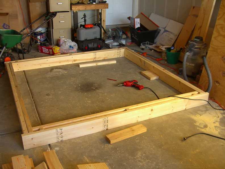 Dry fit of the base before assembling the front and back ends.  I really need to clean up my garage.