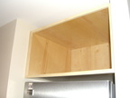 The cabinet over the freezer is installed.  The face frame is scribed to the walls and dry fit waiting for paint.