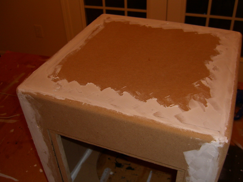 I put spackle on all the seams so that you couldn't see them once I paint it.